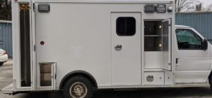 white ford e450 ambulance for sale with all doors open