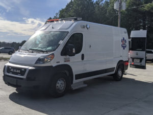 white fr type 2 ambulances in parking lot back open