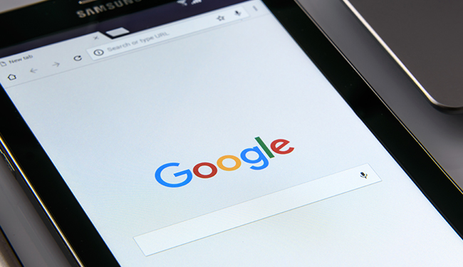 tablet displaying googles homepage